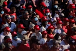 Supporters attend a campaign rally held by U.S. President Donald Trump at Tucson International Airport in Tucson, Arizona, Oct. 19, 2020.