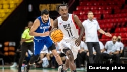 Jean Jacques of the Rwanda Energy Group dribbles the ball during the game against the US Monastir.(Photo by Pape Emir/NBAE via Getty Images)