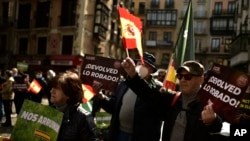 Far right supporters gather to protest against the Spanish Government and the high price of food and energy, in Pamplona, northern Spain, March 19, 2022.