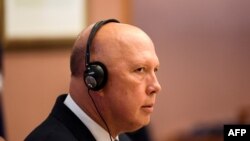 Menteri Pertahanan Australia Peter Duttonzxdi Canberra pada 13 Desember 2021. (Foto oleh LUKAS COCH / POOL / AFP)