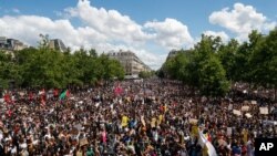 Thousands of people demonstrate against police brutality and racism in Paris, France, June 13, 2020, prior to a march organized by supporters of Adama Traore, who died in police custody in 2016 in circumstances that remain unclear.
