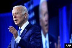 Presiden AS Joe Biden berbicara di National League of Cities Congressional City Conference di Marriott Marquis di Washington, 14 Maret 2022. (Foto: AFP)