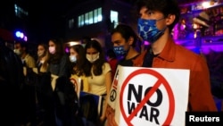 រូបឯកសារ៖ ប្រជាជន​​​អ៊ុយក្រែន និងតៃវ៉ាន់ ចូលរួមក្នុង​ពិធី​បួងសួង​សុំ​ឲ្យចប់សង្គ្រាម​​​នៅ​ក្នុង​ប្រទេស​អ៊ុយក្រែន​​ដែលបានធ្វើឡើង​នៅក្នុង​ទីក្រុង​តៃប៉ិ កាលពី​ថ្ងៃ​ទី៣ ខែ​មីនា ឆ្នាំ​២០២២។