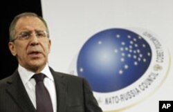 Russia's Foreign Minister Sergei Lavrov holds a news conference after a NATO-Russia foreign ministers meeting at the Alliance headquarters in Brussels, December 8, 2011.