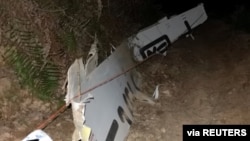 បំណែក​យន្តហោះ ត្រូវបាន​គេឃើញ​នៅ​កន្លែង​ដែល​យន្តហោះ​ប្រភេទ Boeing 737-800 របស់​ក្រុមហ៊ុន​អាកាសចរណ៍​ចិន China Easternដែល​ហោះ​ពី​ទីក្រុង Kunming ទៅ Guangzhou បាន​ធ្លាក់​នៅ​ទីក្រុង Wuzhou នៃ​ប្រទេសចិន​កាលពី​ថ្ងៃទី២១ ខែមីនា ឆ្នាំ២០២២។