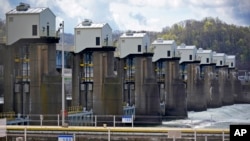 The Emsworth Dam and Lock are seen on the Ohio River in Emsworth, Pa., April 9, 2021. As the U.S. pushes to use more low-carbon energy, some hydropower companies see an opportunity to expand hydropower generation while minimizing environmental harm. (AP /Gene J. Puskar, File)