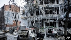 Damaged vehicles and buildings in Kharkiv city center in Ukraine, March 16, 2022. 