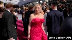 Kirsten Dunst arrives at the Oscars on Sunday, March 27, 2022, at the Dolby Theatre in Los Angeles.