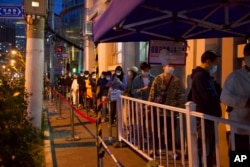 Residents line up for COVID test in Shanghai, China, March 29, 2022.