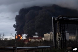 Smoke rises in the air after shelling in Odessa, Ukraine, April 3, 2022.
