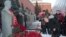 Communist party leader Gennady Zyuganov places flowers on Stalin's grave in Red Square, outside the Kremlin wall, Moscow, March 5, 2013.