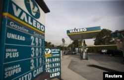 FILE - The prices at a Valero Energy Corp gas station are pictured in Pasadena, California, on Oct. 27, 2015.