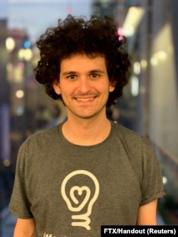 FILE - FTX CEO Sam Bankman-Fried poses for a picture, in an unspecified location, in this undated handout picture, obtained by Reuters on July 5, 2022. (FTX/Handout via REUTERS)