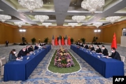 US President Joe Biden (L) and China's President Xi Jinping (R) meet on the sidelines of the G20 Summit in Nusa Dua on the Indonesian resort island of Bali, Nov. 14, 2022.