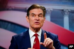 FILE - Mehmet Oz takes part in a forum for Republican candidates for U.S. Senate in Pennsylvania, in Camp Hill, Pa., April 2, 2022.