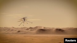 ناسا کی جانب سے مریخ پر روبوٹک ہیلی کاپٹر کی دوران پرواز کی ایک تصوراتی تصویر۔ فائل فوٹو