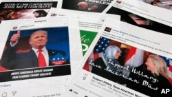 FILE - Some of the Facebook and Instagram ads linked to a Russian effort to disrupt the American political process and stir up tensions around divisive social issues, released by members of the U.S. House Intelligence committee, are photographed in Washington.