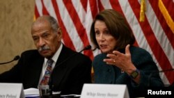 People dance and sing during a demonstration to mark International Women&#39;s Day in front of the parliament building in Athens, Greece.