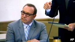FILE - Actor Kevin Spacey attends a pretrial hearing in Nantucket, Mass., June 3, 2019. Prosecutors dropped a case alleging Spacey groped an 18-year-old man in 2016. On May 26, 2022, British prosecutors said Spacey was charged with four counts of sexual assault against three men.