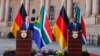 German Chancellor Olaf Scholz, left, and South African President Cyril Ramaphosa conduct a joint press conference during Scholz's visit at the Union Buildings in Pretoria on May 24, 2022.