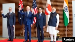 参与印太地区四方安全机制会谈的四国领导人2022年5月24日在东京聚首。（路透社转发媒体联访照片）