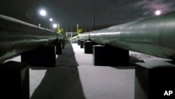 FILE - Russia's Sudzha gas pumping station is seen, Jan. 11, 2009. Fears are growing that Russia could cut gas supplies to Europe entirely. 