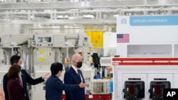 President Joe Biden is guided at the Samsung Electronics Pyeongtaek campus, Friday, May 20, 2022, in Pyeongtaek, South Korea. (AP Photo/Evan Vucci)