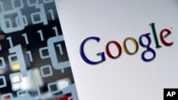 This March 23, 2010, file photo shows the Google logo at the Google headquarters in Brussels, Belgium. (AP Photo/Virginia Mayo, File)