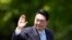 FILE -South Korea's new President Yoon Suk Yeol waves from a car after the Presidential Inauguration outside the National Assembly in Seoul, South Korea, May 10, 2022. This week, he will represent South Korea at the NATO summit in Madrid.