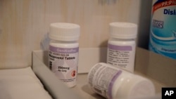 FILE - Bottles of the drug misoprostol sit on a table at the West Alabama Women's Center on Tuesday, March 15, 2022.