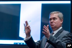 Deputy Director of Naval Intelligence Scott Bray speaks in front of a video display of a UAP during a hearing of the House Intelligence, Counterterrorism, Counterintelligence, and Counterproliferation Subcommittee hearing on May 17, 2022, in Washington. (AP Photo/Alex Brandon)