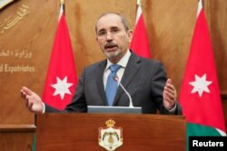 FILE - Jordan's Foreign Minister Ayman Safadi speaks in Amman, Aug. 16, 2021.