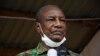 FILE - Guinea's then-President Alpha Conde addresses his supporters during a campaign rally in Kissidougou, Oct. 12, 2020.