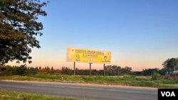 A poster in Harare calling on Zimbabwean citizens to immunise children against measles in 2019 still hangs in Harare three years later. (Columbus Mavhunga/VOA)