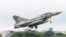 In this photo released May 27, 2022 by the Taiwan Ministry of National Defense, a French made Mirage fighter jet takes off from an airbase near Pingtung in Southern Taiwan. On Tuesday, Taiwan scrambled jets to warn away Chinese aircraft in its air defense identification zone