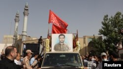 A picture of Colonel Sayad Khodai, a member of Iran's Islamic Revolution Guards is seen at his funeral ceremony, in Tehran, Iran, May 24, 2022.