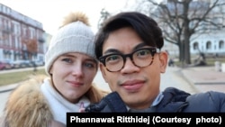 Valeriia Golovakhina, a Ukrainain, and her Thai spouse Phannawat Ritthidej visit the Opera House in Odessa, Ukraine in 2019