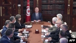 Le président tunisien Kais Saied lors d'une réunion du Conseil national de sécurité le 30 mars 2022 au palais de Carthage.