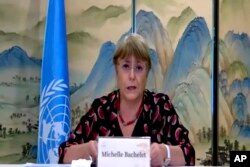 FILE - In this image made from online video, United Nations High Commissioner for Human Rights Michelle Bachelet speaks during an online press conference in Guangzhou in southern China's Guangdong Province, May 28, 2022.