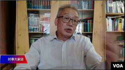 资料照片：王维洛博士连线参加美国之音电视节目