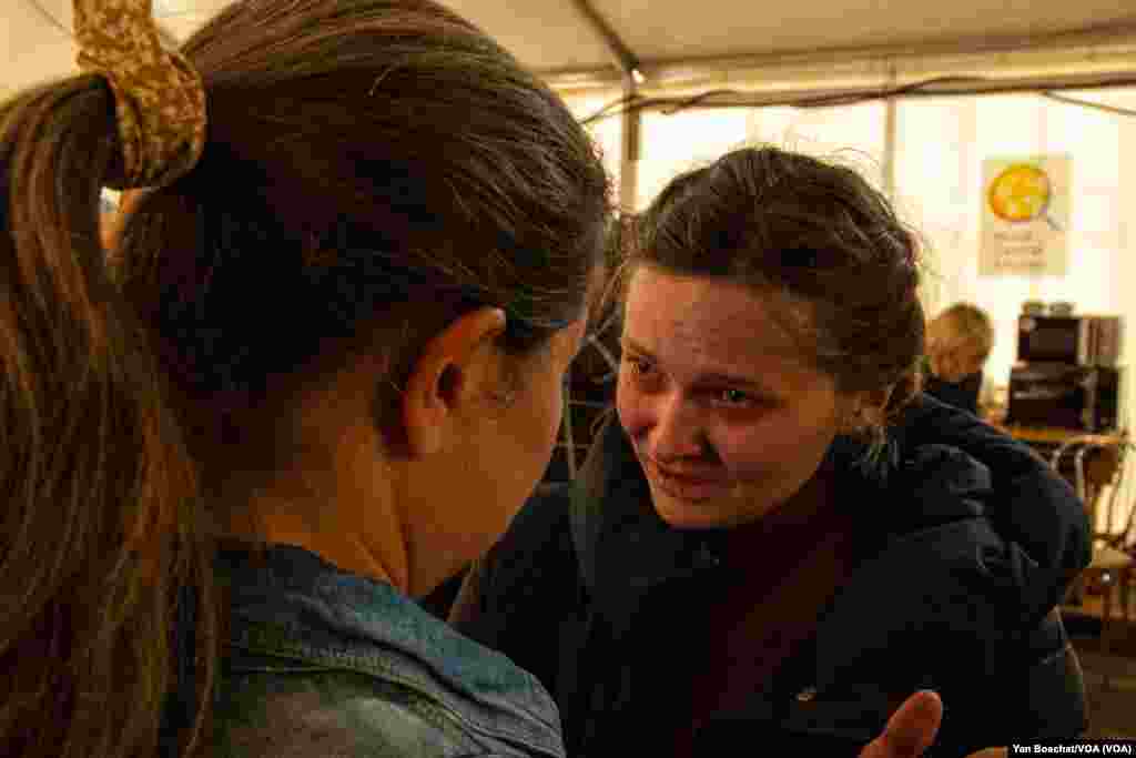 Maria cries after meeting a friend at this refugee center in Zaporizhzhia. She spent the last two months with her son in the subterranean tunnels of the Azovstal steel works in Mariupol until they were rescued by the U.N. and the International Red Cross a