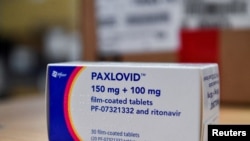 FILE PHOTO: A box of Pfizer's COVID-19 treatment pill, named Paxlovid, at Misericordia hospital in Grosseto, Italy, February 8, 2022. 