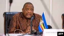 Former Kenyan president Uhuru Kenyatta talks during a press conference, in the meeting room of the Hotel du Fleuve, in Kinshasa, on Nov. 14, 2022. -