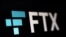 FILE: A photo illustration of the FTX logo, Nov. 8, 2022.