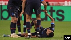 Mosani ya ekolo Maroc na club Olympique Marseille Amine Harit azali kobundana na mpasi na likolo na match na AS Monaco na etando ya masano Louis II, na Monaco, 13 novembre 2022.