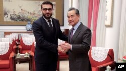 حمدالله محب و وانگ یی، در بیجینگ