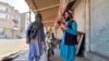 FILE - Taliban fighters patrol in Farah province, southwest of Kabul, Afghanistan, Aug. 11, 2021. Taliban rulers on Dec. 7, 2022, carried out the first public execution of a man charged with murder since returning to power. The execution took place at a stadium in Farah province.