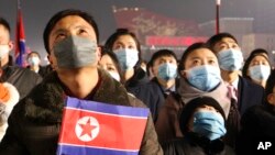 A national flag-hoisting ceremony is held at Kim Il Sung Square in Pyongyang, North Korea, Jan. 1, 2023.