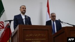 Lebanon's Foreign Minister Abdallah Bou Habib, right, and his Iranian counterpart Hossein Amir-Abdollahian hold a joint press conference at the Foreign Ministry in the Lebanese capital Beirut, on Jan. 13, 2023.