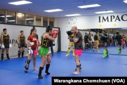Thai female fighter Stamp Fairtex leads a Muay Thai seminar at Impact Martial Arts Academy in Virginia Beach, VA, in October 2022.